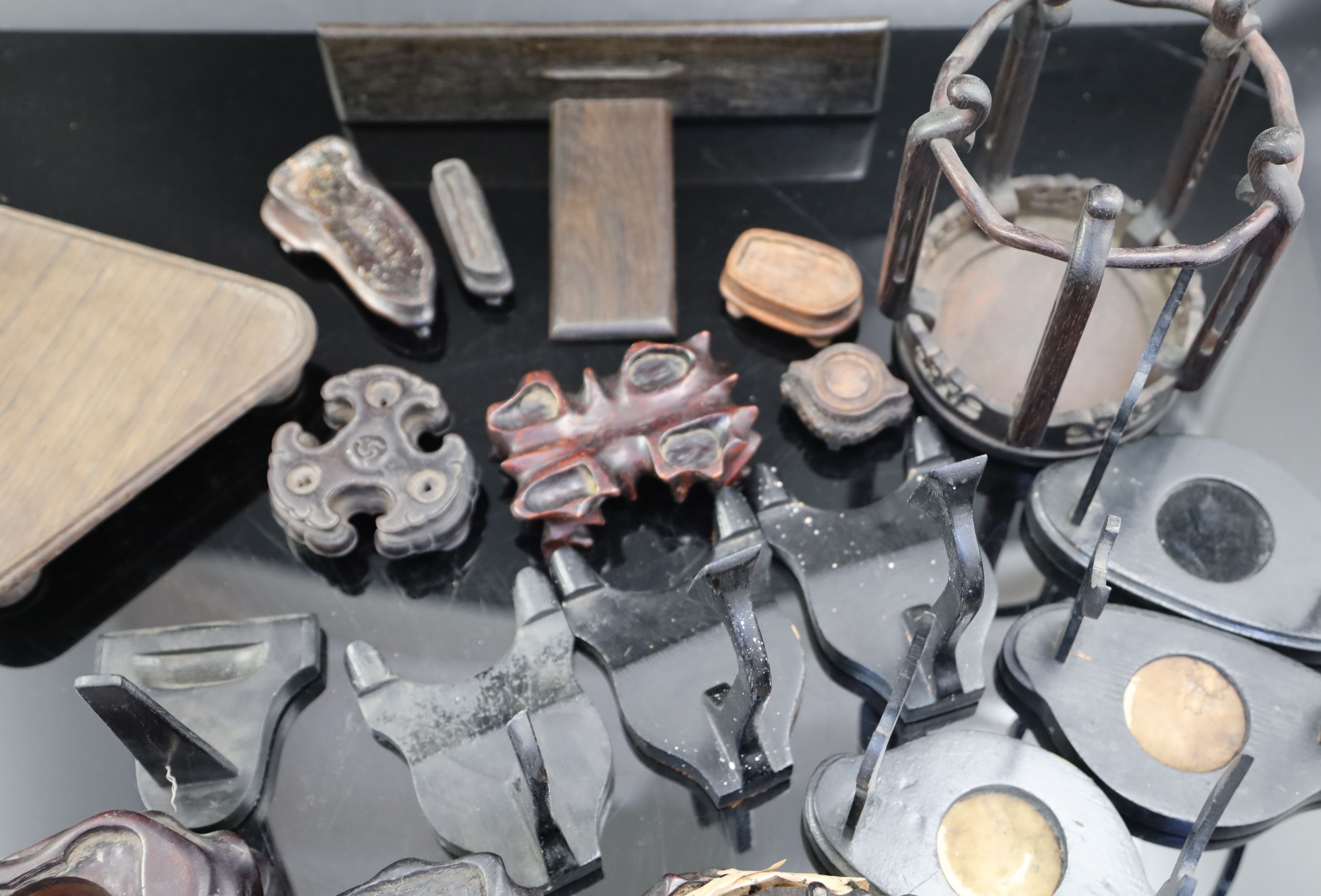 A collection of assorted Chinese hardwood vase stands